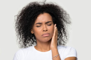 Woman Experiencing Dental Pain