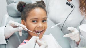 Child Smiling During Dental Checkup